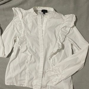 White ruffled blouse